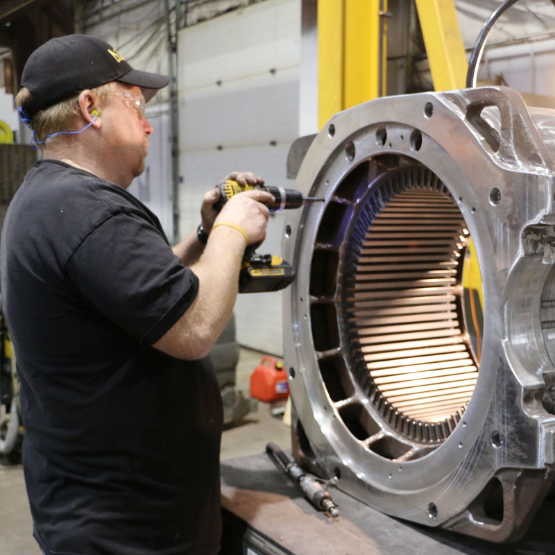 Production Associate performing deburring on an AC Frame at the Piper Lane Location in London Ontario.